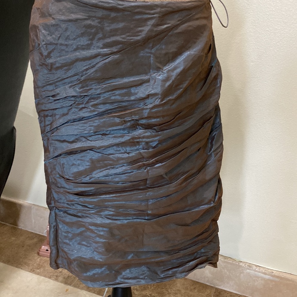 Bought from Neiman Marcus wrinkled skirt with shins in it